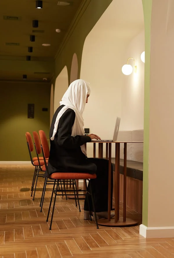 Hijabi working at desk